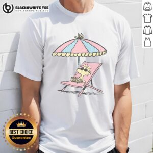 Alt Text: Original Peanuts Woodstock relaxing at the beach t-shirt featuring a colorful graphic of Woodstock enjoying the sun.