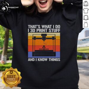 Premium sweatshirt featuring 'That's what I do, I 3D print stuff and I know things' design, perfect for 3D printing enthusiasts.