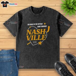 Alt Text: Premium Nashville Predators 'The Road to the Cottage Runs Through' washed t-shirt in vibrant colors, perfect for fans.