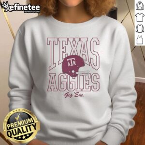 Alt Text: Vintage 1975 Texas A&M Aggies football sweatshirt showcasing classic team logo and colors, perfect for fans.
