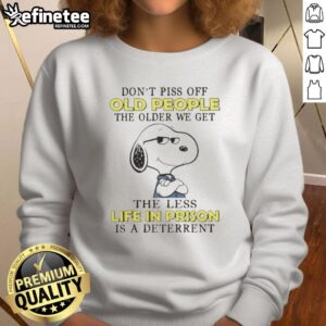 Alt Text: Original Snoopy sweatshirt with quote about aging and prison deterrence, featuring a playful design and vibrant colors.