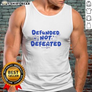 Good Defunded Not Defeated Austin PBS slogan tank top in vibrant colors, promoting support for public broadcasting.