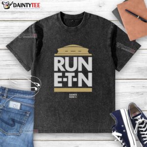 Good Run E.T.N. Saints now washed t-shirt displayed on a white background, showcasing its vibrant team colors and logo.