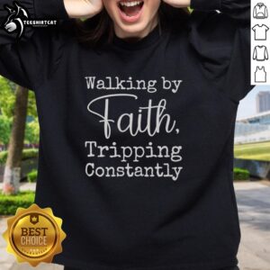 Premium 'Walking By Faith Tripping Constantly' sweatshirt in a cozy design, perfect for faith-inspired casual wear.