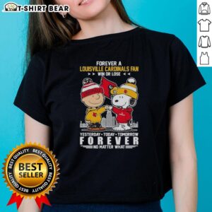 Ladies tee featuring Snoopy and Charlie Brown as Louisville Cardinals fans, perfect for win or lose game days.