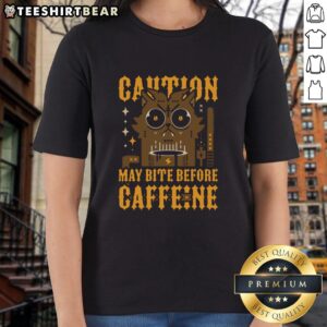 Womens tee shirt featuring 'Top May Bite Before Caffeine' graphic, perfect for coffee lovers and casual wear.