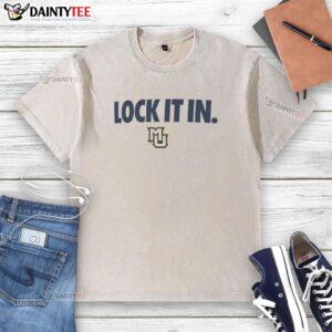 Alt Text: Awesome Marquette Golden Eagles 2026 Lock It In Washed T-Shirt in navy blue, perfect for fans and casual wear.