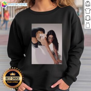 Megan Fox wearing a stylish sweatshirt in a new Instagram photo, showcasing her timeless fashion sense.