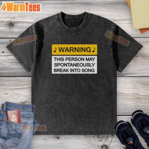 Nice warning may break into song washed t-shirt featuring playful text design on a casual style shirt.