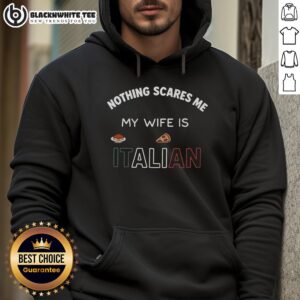 Man wearing 'Nothing Scares Me, My Wife Is Italian' hoodie, showcasing humorous Italian pride and style.