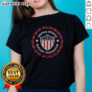 Alt Text: Pretty-Us Soccer 1986 Crest Ladies Tee featuring vintage soccer design and comfortable fit for fans.