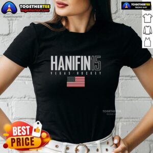 Pretty Noah Hanifin wearing a Vegas Golden Knights USA Flag Elite Ladies Tee, showcasing team spirit and style.
