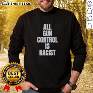 Alt Text: Top All Gun Control Is Racist Sweatshirt design featuring bold text on a casual black hoodie.