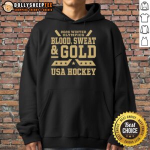 Alt Text: USA Hockey hoodie from the 2026 Winter Olympics, featuring Blood, Sweat, and Gold design for fans and athletes.