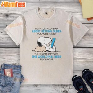 Top Snoopy t-shirt with 'Don't Get All Weird About Getting Older' print, showcasing a playful design for aging fans.