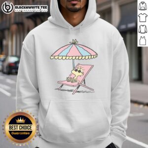 Alt Text: Original Peanuts Woodstock relaxing at the beach in a colorful hoodie, perfect for fans of classic comic characters.