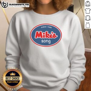 Alt Text: Cozy Good Mikes Song Since 1985 sweatshirt displayed on a wooden background, perfect for music lovers.