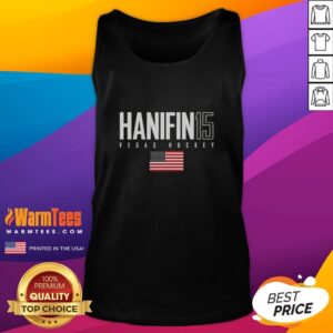 Alt Text: Cute Noah Hanifin wearing a Vegas Golden Knights USA flag elite tank top, showcasing team spirit and style.
