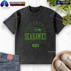 Alt Text: Original Seattle Seahawks Property 1976 washed t-shirt featuring vibrant team colors and vintage logo design.