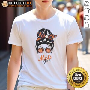 Stylish New York Mets girl wearing a messy bun and glasses, showcasing a trendy Mets T-shirt design.