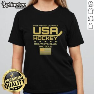 Alt Text: Nice USA Hockey 2026 Winter Olympics ladies tee in red, white, blue, and gold, perfect for cheering on Team USA.