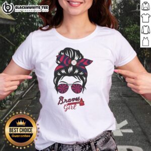 Top Atlanta Braves girl in a messy bun and glasses wearing a stylish ladies tee, showcasing team spirit and fashion.