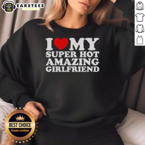 Cozy 'Good I Love My Super Hot Amazing Girlfriend' sweatshirt worn by a smiling woman in a stylish urban setting.