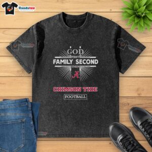 Alt Text: Washed Alabama Crimson Tide football t-shirt with 'God First, Family Second' design, perfect for fans.