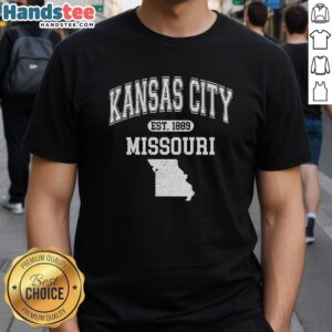 Alt Text: Official Kansas City Missouri Est 1889 Varsity T-Shirt featuring bold lettering and a stylish design in a vibrant color.