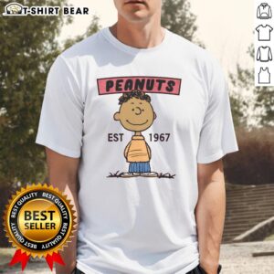 Alt Text: Pretty Peanuts Franklin Est 1967 T-Shirt featuring a stylish design of Franklin from the Peanuts comic strip.
