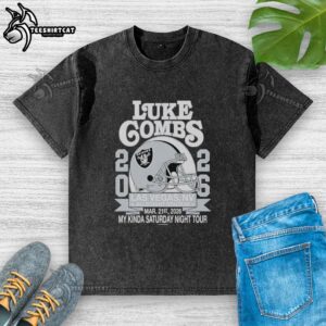 Alt Text: Premium Luke Combs Las Vegas 2026 tour merch featuring a Raiders helmet washed t-shirt at Allegiant Stadium.