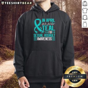 Teal hoodie with a blue ribbon design for Sexual Assault Awareness Month in April, promoting awareness and support.