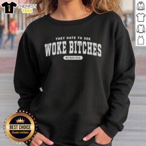 Pretty They Hate To See Woke Bitches Ringer Sweatshirt in vibrant colors, showcasing a trendy, bold graphic design.