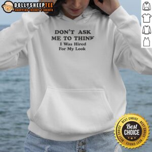 Official Don't Ask Me To Think I Was Hired For My Looks Hoodie in black, featuring bold text and a stylish design.