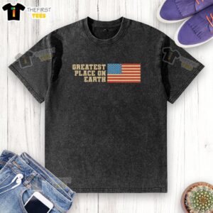 Retro washed T-shirt featuring the American flag with 'Top Greatest Place on Earth' text design for patriotic style.