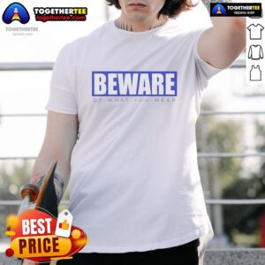 Top Beware Of What You Wear T-Shirt featuring bold graphic design, perfect for fashion-forward individuals.