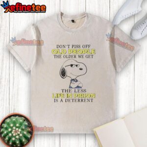 Alt Text: Original Snoopy Don't Piss Off Old People T-Shirt, featuring a humorous quote about aging and life in prison.