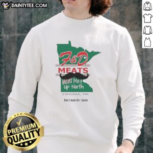 Nice FD Meats Meat Me Up North Virginia MN sweatshirt displayed on a wooden table, perfect for cozy wear.