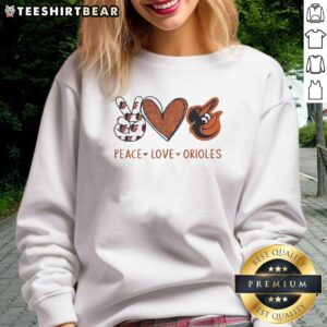 Alt Text: Official Baltimore Orioles sweatshirt featuring a peace love Orioles hand sign in heart shape and logo design.