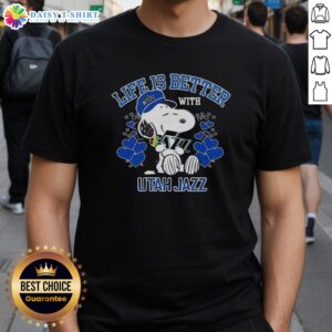 Alt Text: Snoopy wearing a Life Is Better With Utah Jazz t-shirt featuring the Utah Jazz Warriors logo.