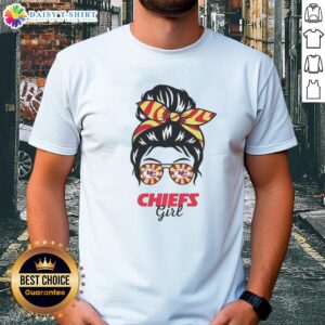 Girl in messy bun wearing Kansas City Chiefs glasses t-shirt, perfect for game day and showing team spirit.