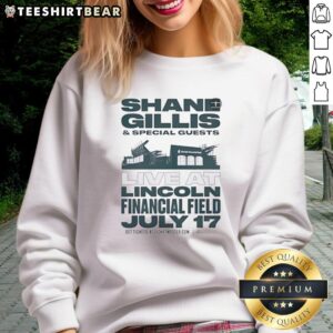 Shane Gillis and special guests performing live at Lincoln Financial Field on July 17, featuring a stylish sweatshirt.