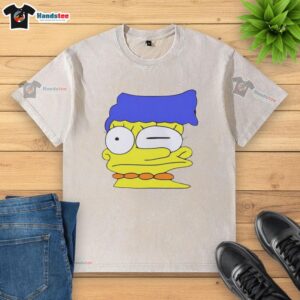 Premium smeared Marge Simpson washed t-shirt featuring vibrant colors and a stylish design for fans of The Simpsons.