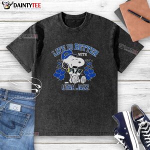 Alt Text: Snoopy wearing a Utah Jazz Warriors logo t-shirt with Life Is Better With Utah Jazz slogan, showcasing fan spirit.