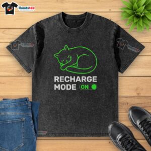 Washed t-shirt featuring a vibrant neon cat design with 'Recharge Mode On' text, perfect for casual wear.