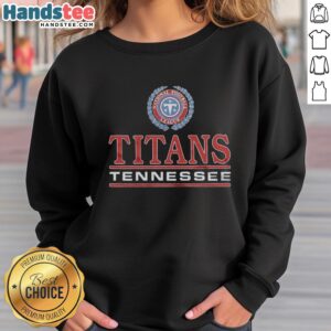 Alt Text: Official Tennessee Titans crest sweatshirt featuring team colors and logo, perfect for fans and game day wear.