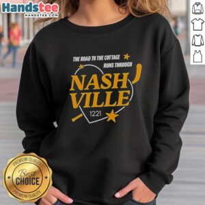 Alt Text: Premium Nashville Predators sweatshirt featuring The Road to the Cottage design, ideal for fans and cozy wear.