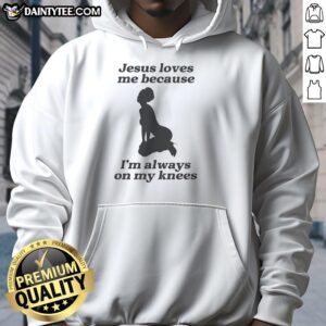 Sexy girl wearing 'Jesus Loves Me Because I'm Always on My Knees' hoodie, showcasing a stylish and trendy design.
