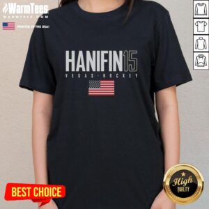 Alt Text: Cute Noah Hanifin in a Vegas Golden Knights tee with USA flag design, perfect for fans and stylish sportswear.