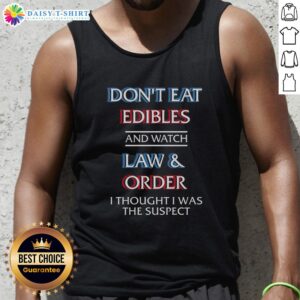Person wearing 'Don't Eat Edibles and Watch TV Show' tank top, humorously referencing confusion during a crime show.